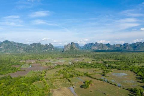 Karst mountains and patchwork fields in Laos 스톡 사진