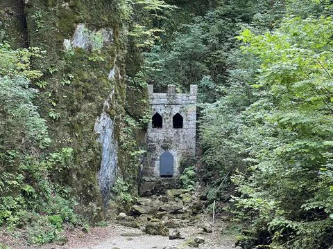 Karst spring in the Sneznik castle complex - Stari trg pri Lozu, Slovenia Stock Photos
