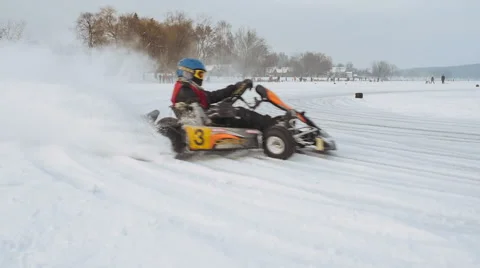 Kart racing on the frozen lake Stock Footage 59040192