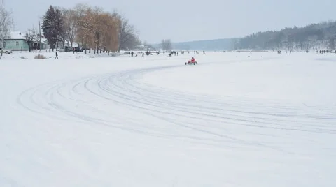 Kart racing on the frozen lake Stock Footage 59042438