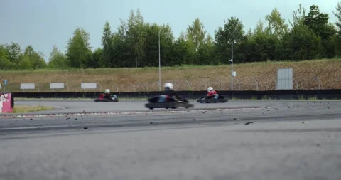 Karts racing on a racetrack  Stock Footage 244917258
