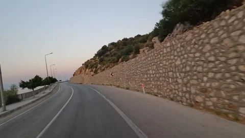 Kas to Kalkan road, Turkey - August 27, 2026 Coastal highway at dawn Stock Footage 344686197
