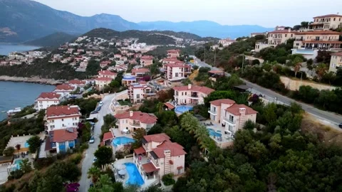 Kas Turkey aerial backward view of villas and coast Stock Footage 344412420