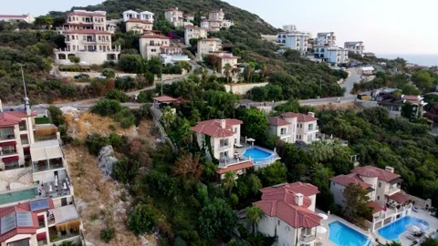 Kas Turkey aerial orbiting view of villas and sea Stock Footage 344406427