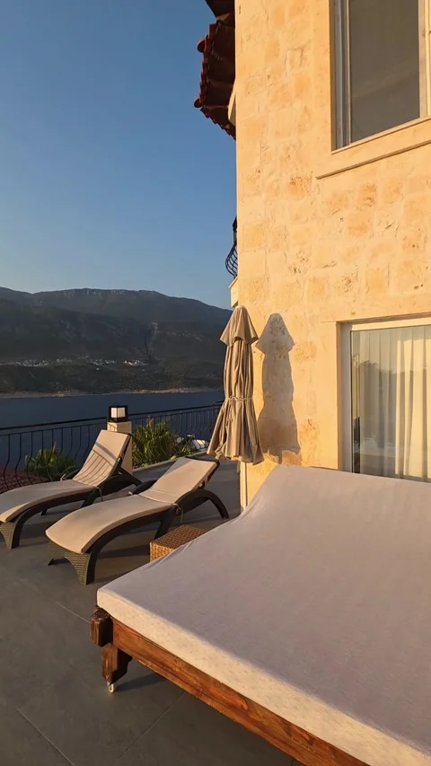 Kas, Turkey - August 22, 2026 Stone villa facade and sun terrace Stock Footage 345145776