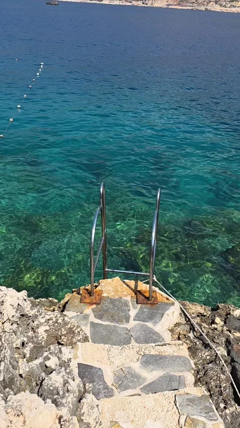Kas, Turkey - August 23, 2026 Steps leading into clear sea water Stock Footage 345145842