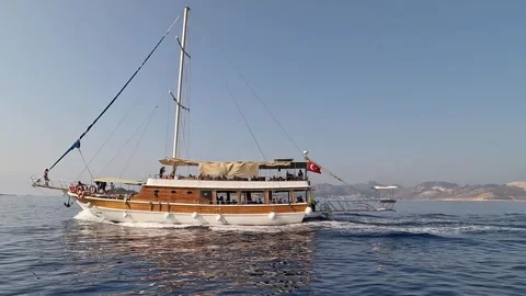 Kas, Turkey - August 25, 2026 Wooden tour boat sailing Stock Footage 344643060