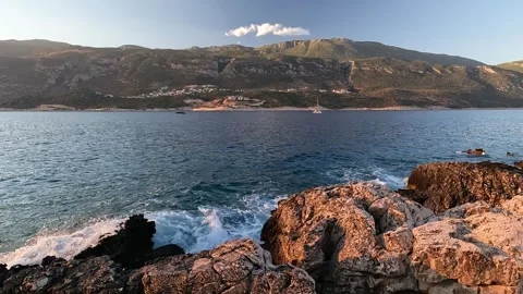 Kas, Turkey - August 29, 2026 Rocky coast and path at sunset Stock Footage 345139124