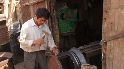 Kashgar metal worker - 4 Stock Footage 5008558