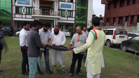 Kashmir Congress members protest in support of Cockroach Janta Party in Srinagar Stock Footage 340405426