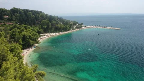 Kasjuni Beach, Split, Croatia - Crowded Summer Scene with Swimmers Stock Footage 301875011