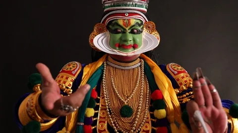 Kathakali dancer expressing through his gestures.  Stock Footage 125356780