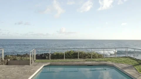 Kauai Flying from Pool to Ocean1 Flat 4k Stock Footage 255809751