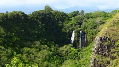 Kauai Hawaii Opaekaa Falls with green hills tourist attraction 4K Stock Footage 73751553