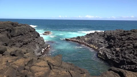 Kauai - waves breaking on lava rocks at Queens Bath Stock Footage 74274764