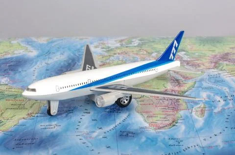 KAUNAS, LITHUANIA - NOVEMBER 05, 2017: Boeing 777 model on the world map. Stock Photos