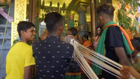 Kavadi worshipers display their devotion in Hindu festival. Stock Footage 89104610