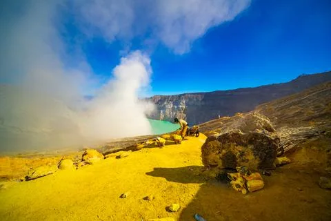 Kawah Ijen Volcano, East Java, Indonesia - August 15 Sulfur miners at work .. Stock Photos