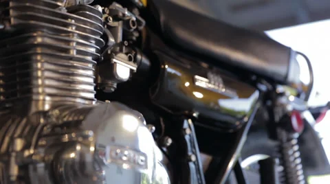 Kawasaki 900 Motorcycle Engine rack focus Stock Footage 34333925