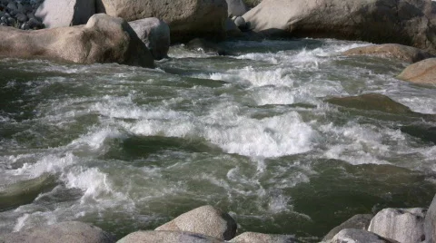 Kaweah River flows downstream through the rocks, creating whitewater rapids Stock Footage 360278