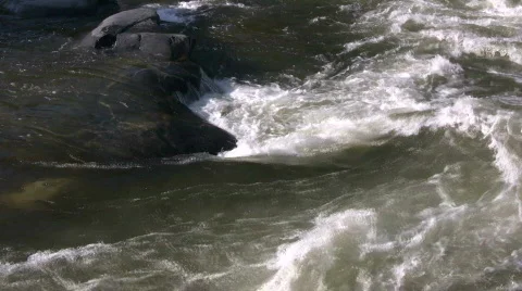 Kaweah River flows downstream through the rocks, creating whitewater rapids Stock Footage 360279