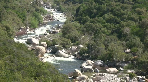 Kaweah River flows downstream through the rocks, creating whitewater rapids Stock Footage 360336