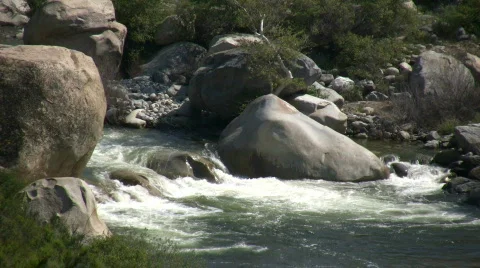 Kaweah River flows downstream through the rocks, creating whitewater rapids Stock-Footage 360337