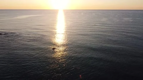 Kayak at the beach drone aerial view. Kayaker trolling fishing Stock-Footage 241237473
