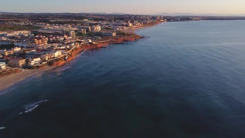 Kayak at the beach drone aerial view. Kayaker trolling fishing Video stock 241237488