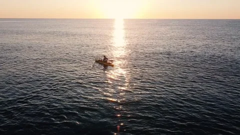 Kayak at the beach drone aerial view. Kayaker trolling fishing Vídeos de archivo 241237703