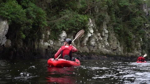 Kayak being rowed down a river. Stock Footage 199220589