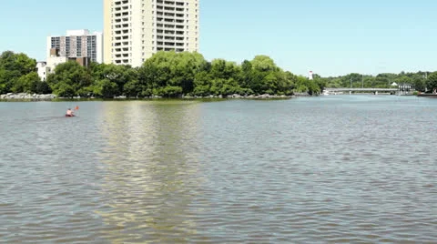 Kayak crossing river Stock Footage 26354874