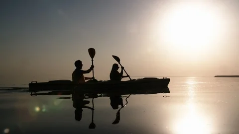 Kayak-deuce on sunset background 動画素材 94835792
