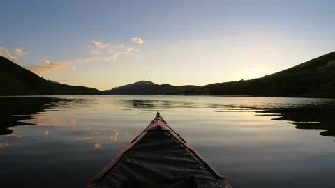 Kayak Floating on Lake at Sunset Video stock 289653347