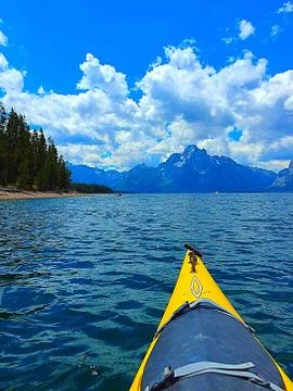 Kayak jackson lake wyo Stock Photos
