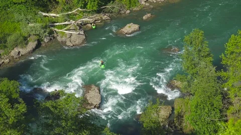 Kayak on Raging River with Rapids seen from Above Stock Footage 75832361