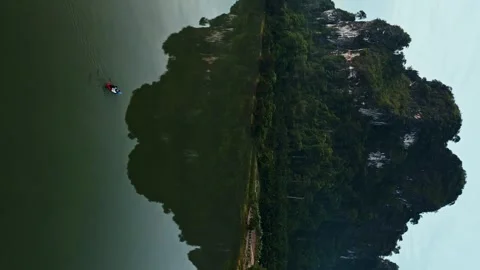 Kayak on Reflective Waters Rock Reflection in Tropical River, Krabi, Thailand Stock Footage 279793389