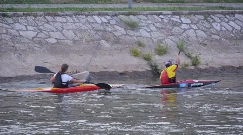 Kayak rowing on city river Stock Footage 52607464
