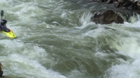 Kayak Swallowed by Rapids Stockbeeldmateriaal 54596582
