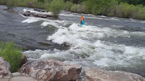 Kayak Turns Over and Rights Itself Whitewater River Kayaking on Man Made Wave Stock Footage 340242570