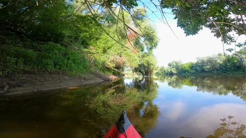 Kayak went down a river under trees . Travel landscape Stock Footage 166399748