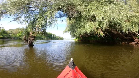 Kayak went down a river under trees . Travel boating landscape Stock Footage 166538027
