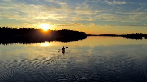 Kayaker in a beautiful sunset 1 Stock-Footage 136021933