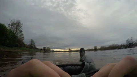 Kayaker floating on the River Stock Footage 160275045