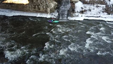 Kayaker Going Down River Winter Time - No-02 Stockbeeldmateriaal 104200283