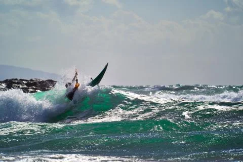 Kayaker jump on the wave Stock Photos