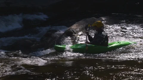 Kayaker kayaking in the gushing river Stock Footage 103825149