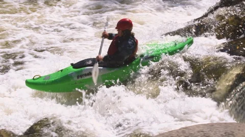 Kayaker kayaking in the gushing river Stock Footage 103825156