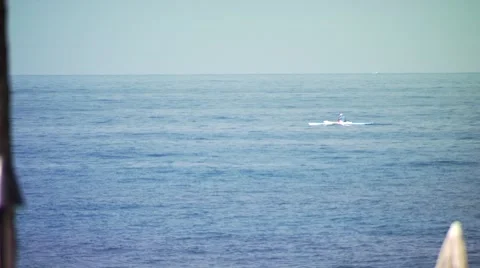 Kayaker kayaking in sea Stock Footage 54592642