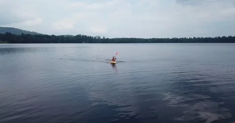 A Kayaker &amp; the Loon Stock Footage 113967545